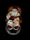 885114450176 Napco Christmas Santa Claus In Chair With Puppy Dogs Resin