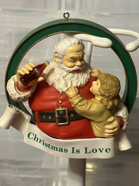 H2803 Coca-cola Santa Holds Child Christmas Is Love Ornament 1990