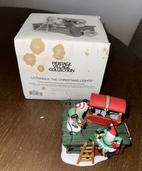 56374 Department 56 Heritage Collection Inch Untangle The Christmas Lights #56374