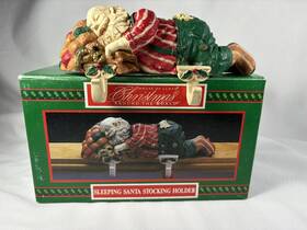 541920 House Of Lloyd Christmas Around The World Sleeping Santa 2 Stocking Holder