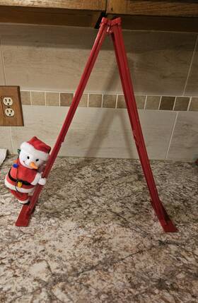 Mr. Christmas 051053372682 Table Top 17 Inch Climbing Santa Music And Lights Works