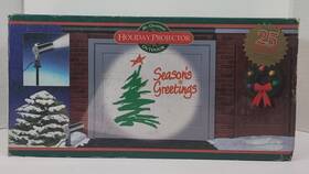 051100100 Mr. Christmas 1999 Outdoor Holiday Projector 25 Slides For Every Season