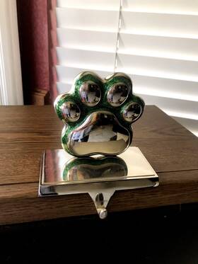 Hl9181779 The Christmas Shop Paw Print Dog Cat Stocking Hanger Silver And Green With Pedestal Base