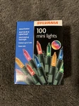 Sylvania 100 Multicolor Mini Lights Green Wire (new). Fixed Price $5.49.