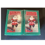 Hallmark Santa Claus Christmas Mantel Stocking Hanger Set Of 2 QSH8104. Fixed Price $12.99.