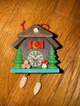 Alexander Taron Christian Ulbricht Ornament - Cuckoo Clock Natural. Fixed Price $15.00.