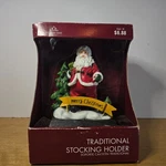 Vintage Holiday Time Stocking Holder Hanger Santa Claus (broken Candy Cane). Fixed Price $19.99.