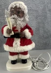Santas Best Christmas Decoration Clause Plush With Light Up Candle. Fixed Price $11.99.