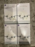 4 Lot Wondershop 25CT C9 Faceted Christmas String Lights Warm White Green Wire. Fixed Price $29.99.