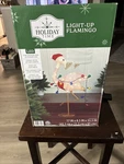 Holiday Time 32" Light-up Fluffy Christmas Flamingo, 35 Lights. Fixed Price $42.50.