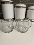 Pair Crate & Barrel White Snowflake Clear Glass Coffee Tea Mugs 12OZ. Fixed Price $22.00.