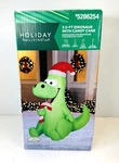 Holiday Living Gemmy 3.5 Dinosaur With Santa Hat & Candy Cane Inflatable Led. Fixed Price $15.99.