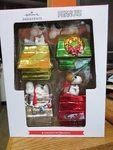 Hallmark Ornaments 2023 Peanuts Snoopy Glass Holiday Dog Houses Set Of 4--NIB. Fixed Price $55.00.