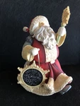 Enesco Heart Of Christmas Santa With Snowman Figurine 8.27. Fixed Price $95.00.