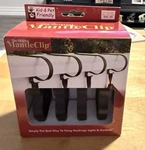 The Original Mantle Clip. Hang Stockings, Lights, Garland. Model # MC0480NIB. Fixed Price $11.00.