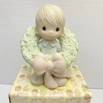 Little Boy In Christmas Wreath Xmas Bow Surrounded With Joy 1983 Precious Moment. Fixed Price $18.02.