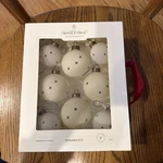 Hearth & Hand Magnolia Glass Christmas Ornaments (8) Off White Black X Stitch. Fixed Price $29.99.