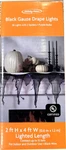 Holiday Home Black Gauze Drape Lights 36 W/ 2 Spiders Purple Bulbs - New. Fixed Price $9.89.