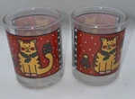 2 Vintage Anchor Hocking Red Holiday Christmas Cat Shot Glass Candle Holder. Fixed Price $14.99.