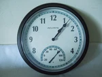 Acu-rite Quartz Wall Clock Time & Temperture 13 1/2" Diameter Black White. Fixed Price $35.00.