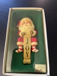 Russ Christmas Stocking Hanger 4660 Santa Holding Joy Banner. Fixed Price $8.99.