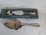 International Serving Silverplate 11 Cake Pie Server Merry Christmas. Fixed Price $6.00.