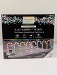Gemmy Orchestra Of Lights 8 Color Changing Candy Cane Christmas Pathway Stakes. Fixed Price $69.95.