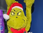 The Grinch Tree Hugger Christmas Top Holiday Decoration Style #A20719. Fixed Price $38.00.