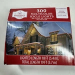 300 Multicolor Icicle Holiday Time Christmas Lights White Wire 18'. Fixed Price $22.99.