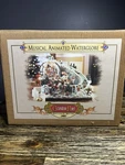 Grandeur Noel Musical Animated Waterglobe Collectors Edition 2002 #15571 In Box. Fixed Price $50.00.