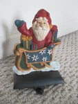 Russ Berrie Cast Iron Santa Stocking Holder. Fixed Price $29.99.