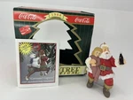 1995 Coca-cola Trim-a-tree Collection Ornament "santa Holding Child Sitting". Fixed Price $8.99.