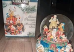 Vtg '95 1 Foot Tall Kirkland Santa's Workshop Musical Wateglobe Revolving Base. Fixed Price $30.00.