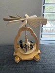 Christmas Holiday Carolers Pyramid Carousel Wood Material With Candle Holder. Fixed Price $69.99.