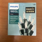 Philips 100 Clear Mini String Lights With Green Wire Christmas Remains Lit New. Fixed Price $12.99.