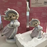 Precious Moments Sparkle With Joy Girl Ice Skater #104202 W/104203 (ornament). Fixed Price $24.95.