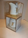 Merry Brite Porcelain Covered Sugar And Creamer, Dancing Reindeer. Fixed Price $19.99.
