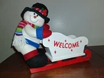 Christmas Welcome Decoration Plush Snowman Wood Sleigh Card Holding. Fixed Price $25.00.