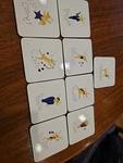 Pottery Barn Set Of 9 Santa's Reindeer 4" Coasters Cork Back Unused. Fixed Price $25.00.
