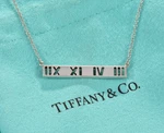 Tiffany & Co Silver Atlas Roman Numeral Bar Pendant Adjustable Necklace In Pouch. Fixed Price $199.99.