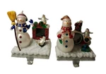 2 Picture Frame Christmas Stocking Holder Color Changing Lights Snowman Penguins. Fixed Price $99.00.