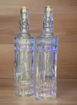 Greenbrier International Clear Glass Bottles Corked Set Of 2. Fixed Price $18.00.