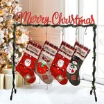 Huthdak Metal Merry Christmas Stocking Holder Stand With 6 Hooks, S.... Fixed Price $87.69.