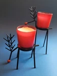 3 Sets Of 2 Iron Reindeer Tea Light & Candle Holders. Total 6. Fixed Price $45.00.