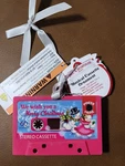 New Cassette Image Pink Ornament Plays We Wish You Merry Mr Christmas. Fixed Price $14.00.