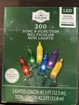 Holiday Time 200 Sync 8-FUNCTION Multi Color Mini Led String Lights Green Wire. Fixed Price $34.99.