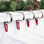 The Original Mantleclip Stocking Holder By Haute Decor Holly Embossed Design 4PC. Fixed Price $10.00.