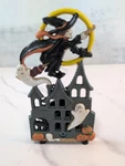 Cast Iron 6.5" Tall Witch & Haunted House Halloween Tea Light Candle Holder. Fixed Price $20.00.
