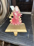 Roman Angel Christmas Stocking Hanger Cast Iron Base, Resin Figure. Fixed Price $19.99.
