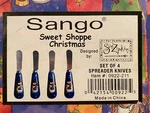 Sango Sweet Shoppe Christmas 4 Stainless & Ceramic Spreaders Knives Nib. Fixed Price $5.75.